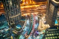 Aerial View Of Urban Background Of Illuminated Cityscape With Towers In Dubai. Street Night Traffic In Dudai Skyline Royalty Free Stock Photo