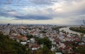 Aerial view of of urban cityscape with Hung Vuong bridge across the Ba river at dusk