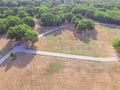 Aerial view urban park with paved pathway in Texas, USA