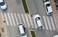 Aerial view of urban street with white cars and pedestrian crossing Royalty Free Stock Photo