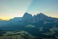 Aerial view of the valley in the fog during dawn in the Alpe di Suisi region. Dolomites in Italy in the fall