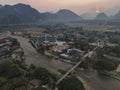 Aerial view of Vang Vieng and Nam Song river at sunset, Laos Royalty Free Stock Photo