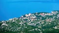 Aerial view from velebit mountains on valley with village of Karlobad, meditarranean sea background - Croatia