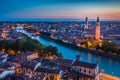 Aerial view of Verona city night cityscape and church Santa Anastasia, with Adige river , located in Veneto, Italy, viewed from Royalty Free Stock Photo