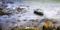 Aerial view about a very simple fishing boat on a cold autumn mo Royalty Free Stock Photo