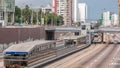 Aerial view of Via Expresa highway and metropolitan bus with traffic timelapse and blue sky with clouds. Lima, Peru