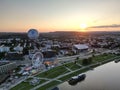 Aerial view of a vibrant city skyline illuminated by a stunning golden sunset in Krakow, Poland