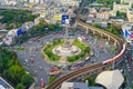 Aerial view of Victory Monument on busy street road. Roundabout in Bangkok Downtown Skyline. Thailand. Financial district center