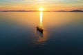 aerial view of viking ship on calm sea during sunset Royalty Free Stock Photo