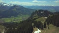 Aerial view on the village of Bad Hindelang in the Allgau Alps on a sunny day in May with last snow in the higher