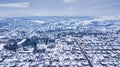 Aerial view village among the fields and forests in winter Royalty Free Stock Photo