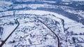 Aerial view village among the fields and forests in winter Royalty Free Stock Photo