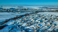 Aerial view village among the fields and forests in winter Royalty Free Stock Photo