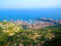 Aerial view from village La Turbie to Principality Monaco, Monte-Carlo, port Hercule, Prince Palace, Mountains, yachts, boats, sky Royalty Free Stock Photo