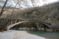 Aerial view of voidomatis river with the clear waters and the famous bridge in epirus Greece Royalty Free Stock Photo
