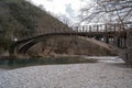 Aerial view of voidomatis river with the clear waters and the famous bridge in epirus Greece Royalty Free Stock Photo