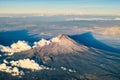 Aerial view of volcano Popocatepetl under blue sky