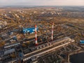 Aerial view of Voronezh Power Plant or station with high chimneys near water reservoir at sunset, drone photo Royalty Free Stock Photo