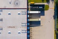 Aerial view of warehouse storages or industrial factory or logistics center from above. Aerial view of industrial buildings and Royalty Free Stock Photo
