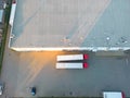 Aerial view of warehouse storages or industrial factory or logistics center from above. Aerial view of industrial buildings and Royalty Free Stock Photo