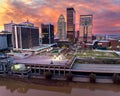 Aerial view of the warm pink sunrise over the modern skyline of Louisville KY