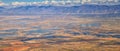 Aerial view of Wasatch Front Rocky Mountain landscapes on flight over Colorado and Utah during winter. Grand sweeping views near t