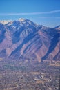 Aerial view of Wasatch Front Rocky Mountain landscapes on flight over Colorado and Utah during winter. Grand sweeping views near t