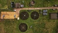 Aerial view of a wastewater treatment facility with circular tanks amidst green fields in North Yorkshire Royalty Free Stock Photo