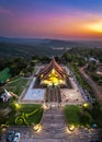 Aerial view of Wat Sirindhorn Wararam glowing temple in Ubon, Thailand