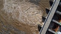 Aerial view of water released from the drainage channel of the concrete dam is a way of overflowing water in the rainy season. Top Royalty Free Stock Photo