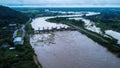 Aerial view of water released from the drainage channel of the concrete dam is a way of overflowing water in the rainy season. Top Royalty Free Stock Photo