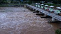 Aerial view of water released from the drainage channel of the concrete dam is a way of overflowing water in the rainy season. Top Royalty Free Stock Photo