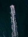 aerial view of the water scooter or personal watercraft or ski jet racing through the sea waves