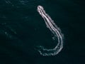 aerial view of the water scooter or personal watercraft or ski jet racing through the sea waves