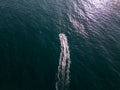 aerial view of the water scooter or personal watercraft or ski jet racing through the sea waves