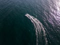 aerial view of the water scooter or personal watercraft or ski jet racing through the sea waves