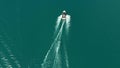 Aerial view of water skiing with motorboat on the sea with blue water. Waterski