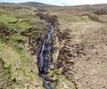 Aerial view of a waterfall in the mountains near Crolly in County Donegal - Ireland