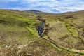 Aerial view of a waterfall in the mountains near Crolly in County Donegal - Ireland