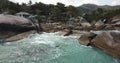 Aerial view of the waves that break on the stones