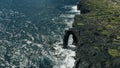 aerial view Waves crash along the Holei Sea Arch in the Hawaiian Volcanoes National Park