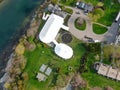 Aerial view of wedding reception ceremony setup with big white tents