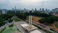 Aerial view of West Irian Liberation monument in downtown Jakarta with Jakarta cityscape. Jakarta, Indonesia, August 29, 2022 Royalty Free Stock Photo