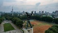 Aerial view of West Irian Liberation monument in downtown Jakarta with Jakarta cityscape. Jakarta, Indonesia, August 29, 2022 Royalty Free Stock Photo