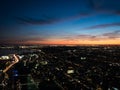 Aerial view of western Toronto at sunset with lights and car traces visible Royalty Free Stock Photo
