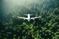 Aerial view of White Airplane taking off or flying in the air above green rain forest mountain view, nature landscape, healthy