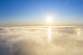 Aerial view White clouds in blue sky with solar halo. Top view. View from drone. Aerial bird`s eye view. Aerial top view cloudsca