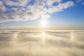 Aerial view White clouds in blue sky with solar halo. Top view. View from drone. Aerial bird`s eye view. Aerial top view cloudsca