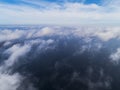 Aerial view White clouds in blue sky. Top view. View from drone. Aerial bird`s eye view. Aerial top view cloudscape. Texture of cl Royalty Free Stock Photo