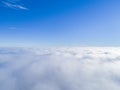 Aerial view White clouds in blue sky. Top view. View from drone. Aerial bird`s eye view. Aerial top view cloudscape. Texture of cl Royalty Free Stock Photo